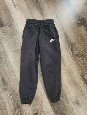 Nike Kids Black Jogger Sweatpants with White Swoosh